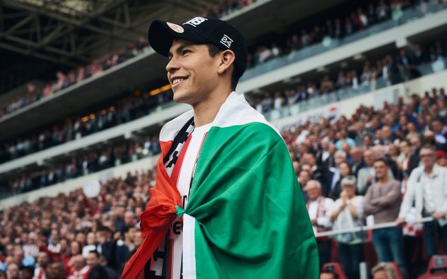 Hirving Lozano wearing a Mexican flag during PSV Eindhoven title celebrations