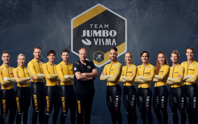 Group photo of the Jumbo-Visma ice skating team in 2019